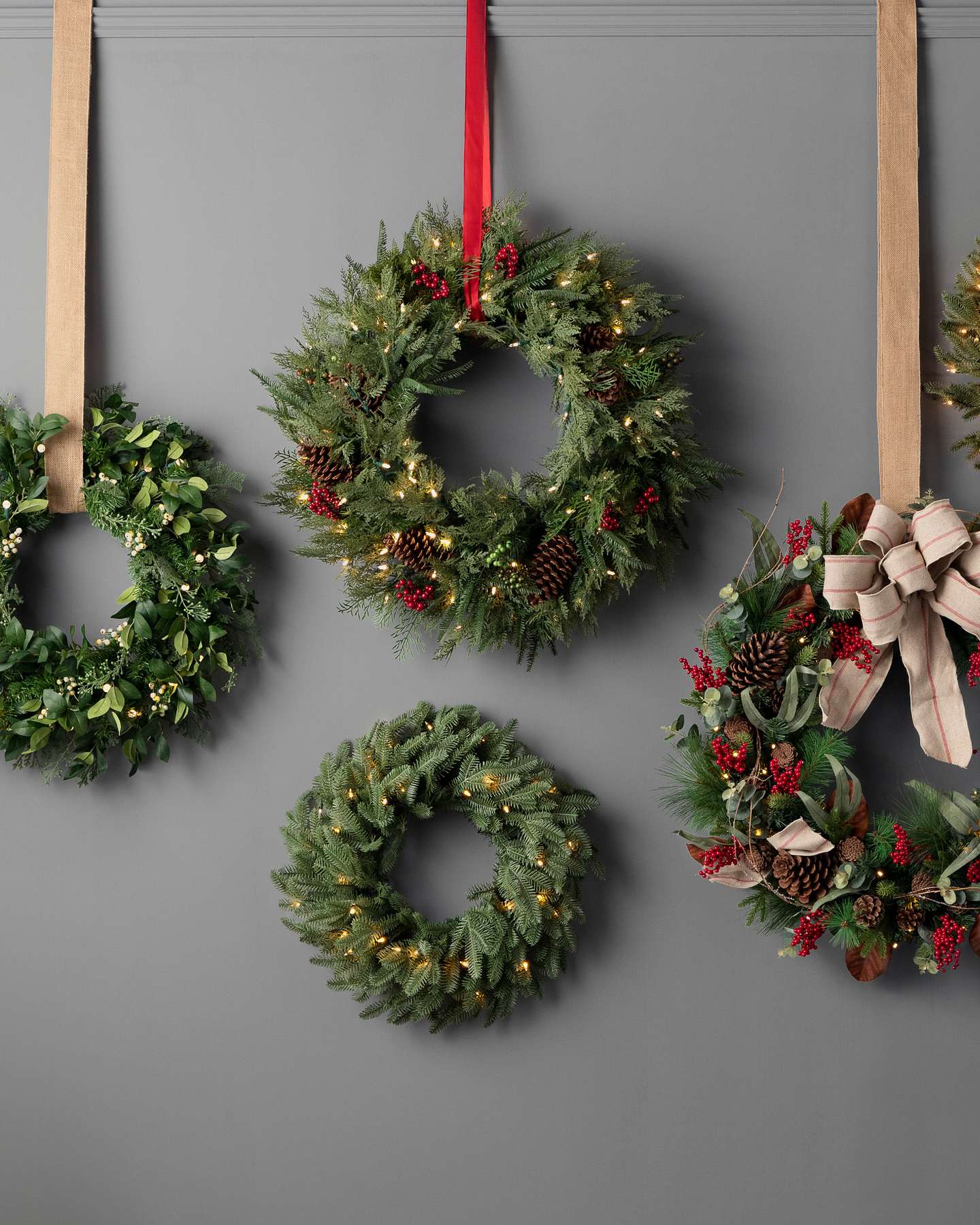 Balsam Hill Balsam Fir Artificial Christmas Wreath Lifestyle Display with Other Wreaths