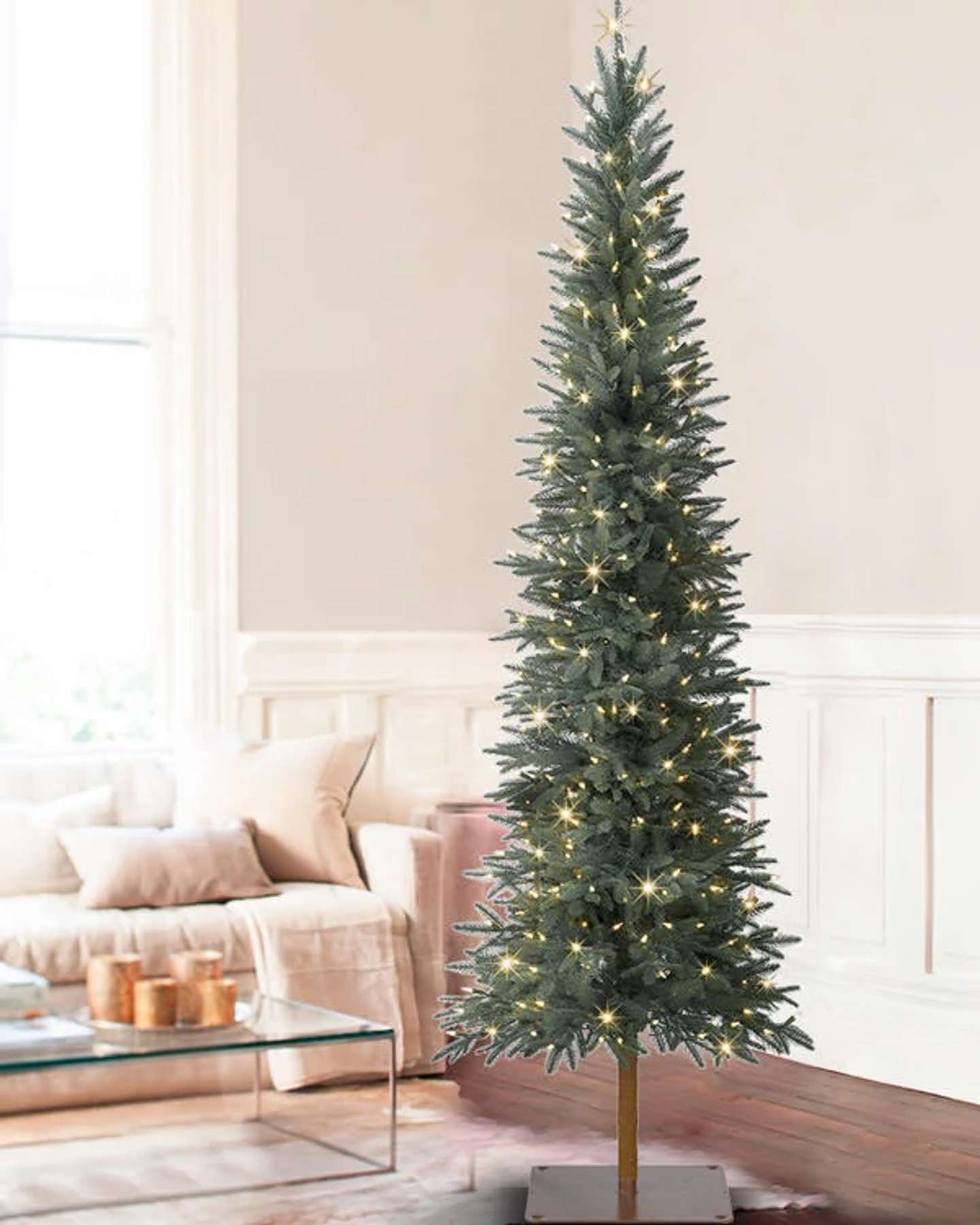 Balsam Hill Revelstoke Fir Artificial Christmas Tree in a Holiday-Themed Room