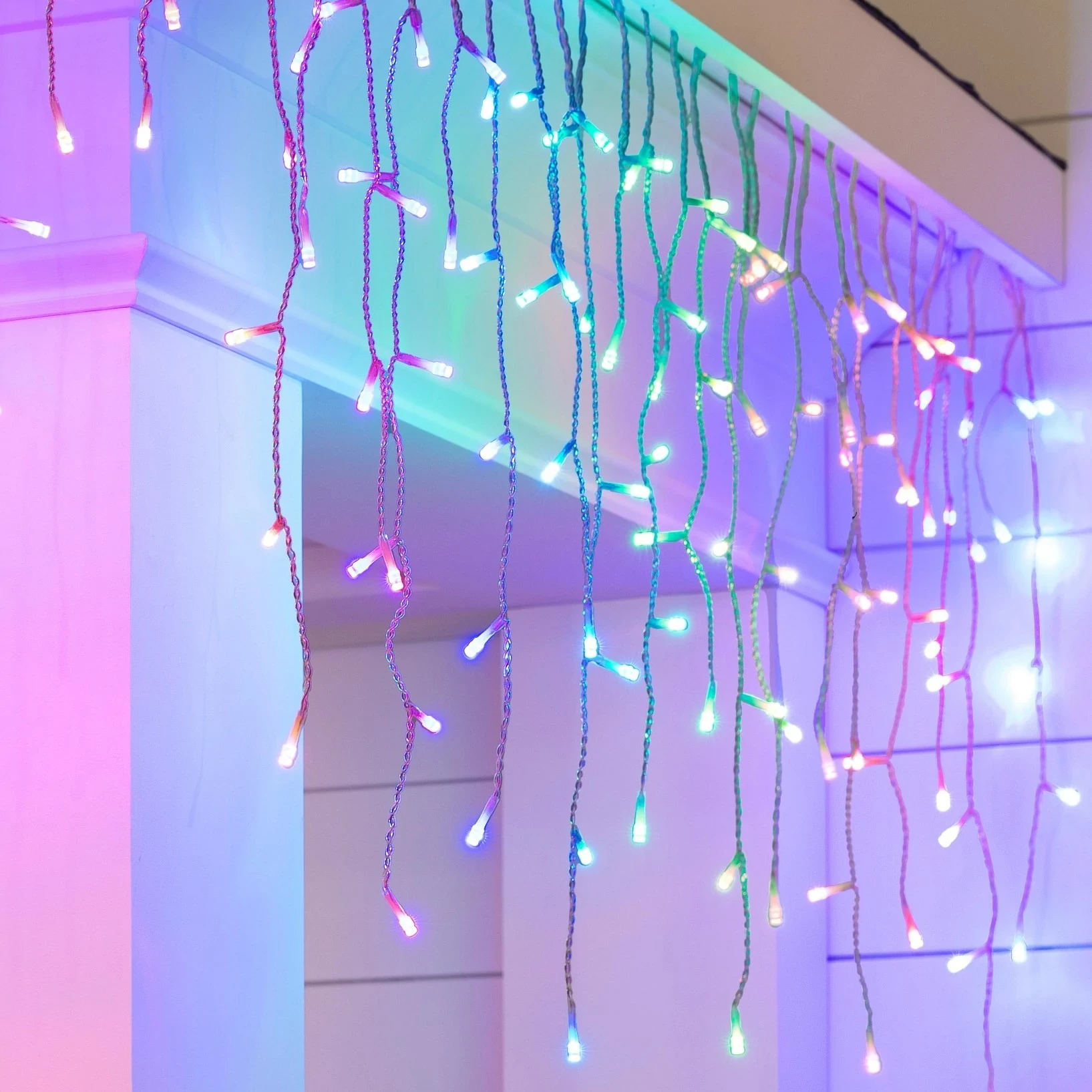 A string of multicoloured curtain Christmas lights