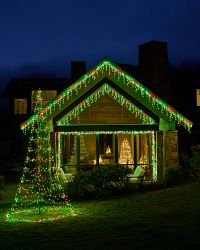 A house decorated with Twinkly lights and Twinkly cone tree