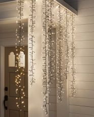 Cascading string lights hung on a porch