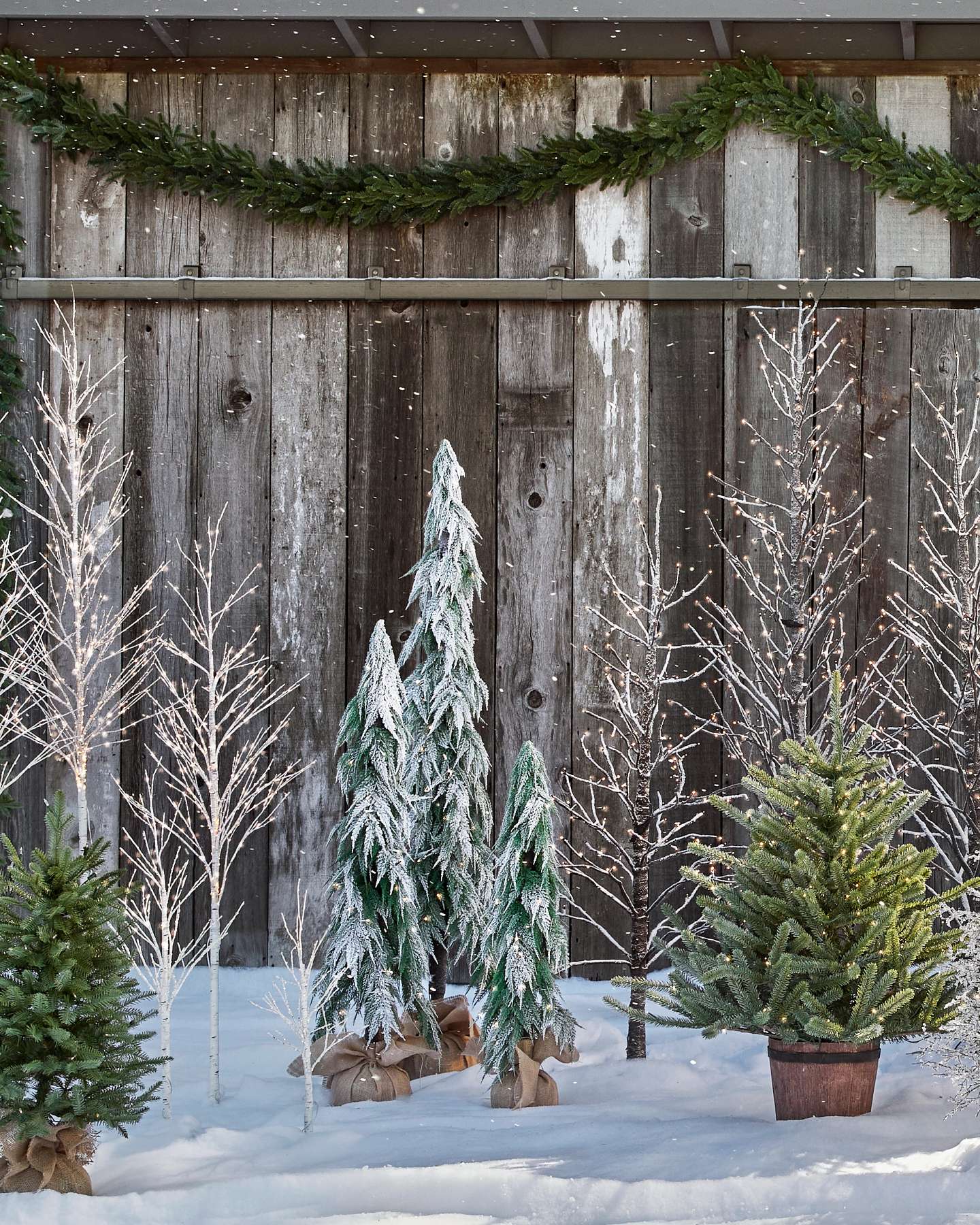 Balsam Hill Snowfall Downswept Artificial Christmas Tree in a Festive Living Room