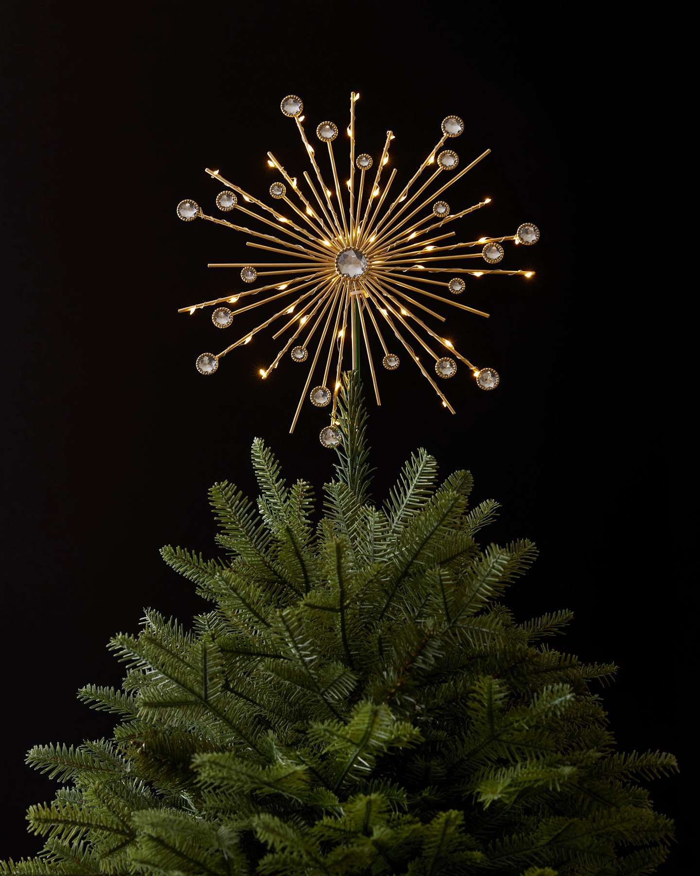 Étoile de Noël dorée illuminée