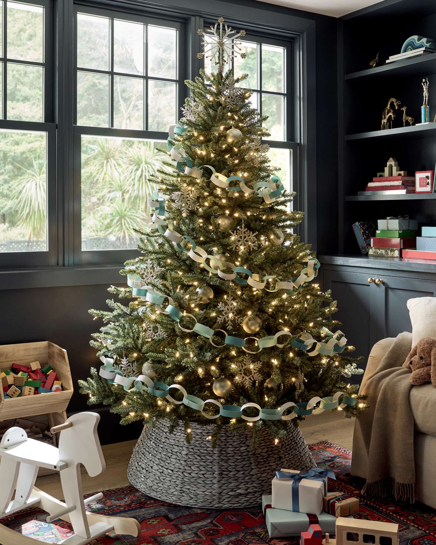Balsam Hill Classic Blue Spruce Artificial Christmas Tree Lifestyle Diplay with Wooden Toys