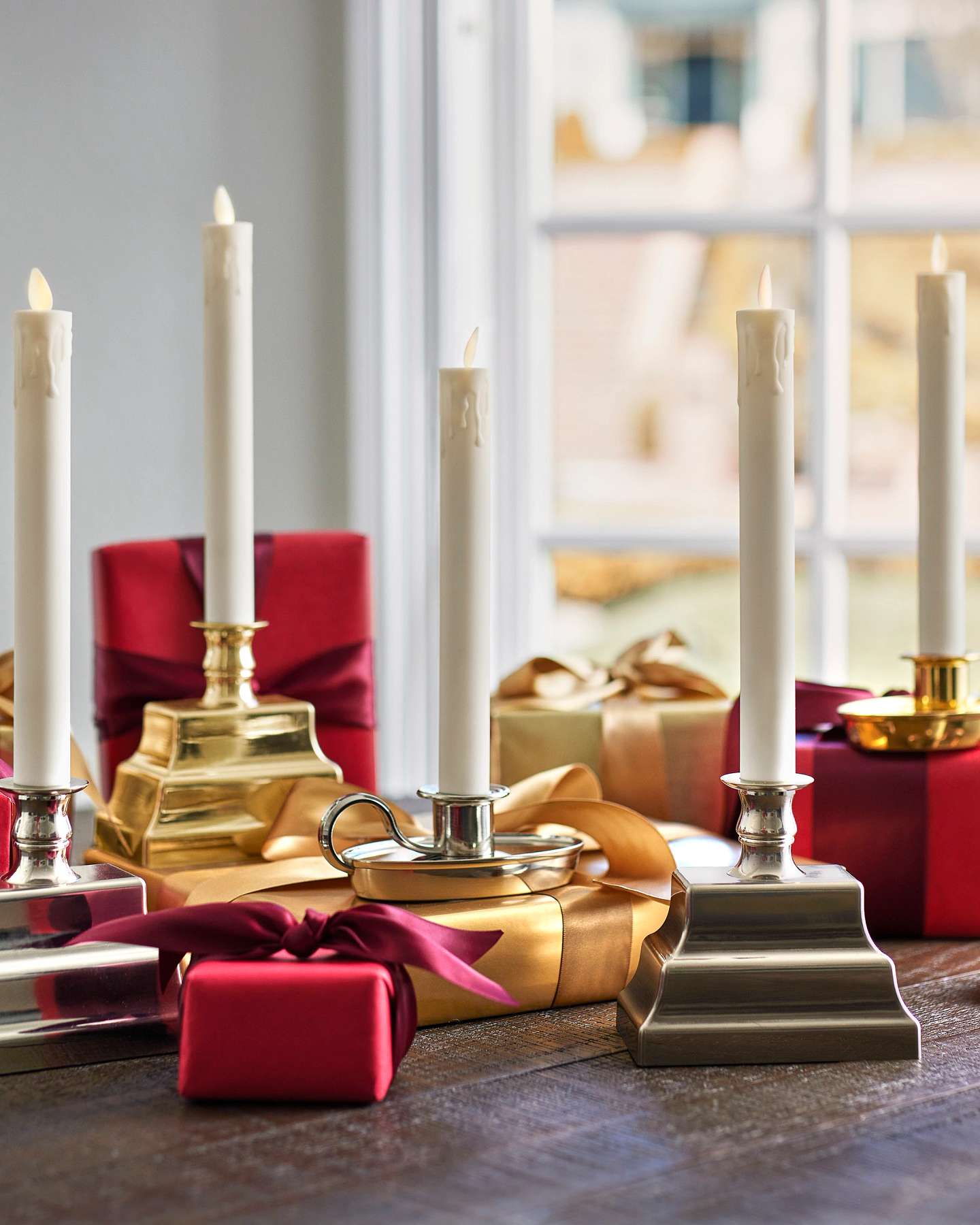 Balsam Hill Miracle Flame LED Window Candles Set of 2 Displayed with Draped Curtains and Garland