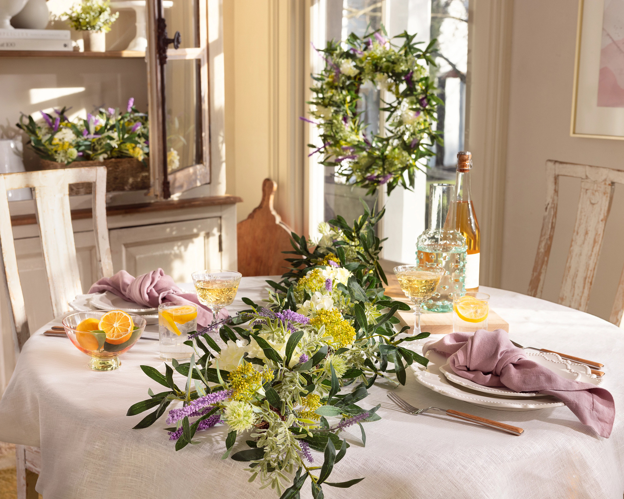 Dining table with artificial flower garland