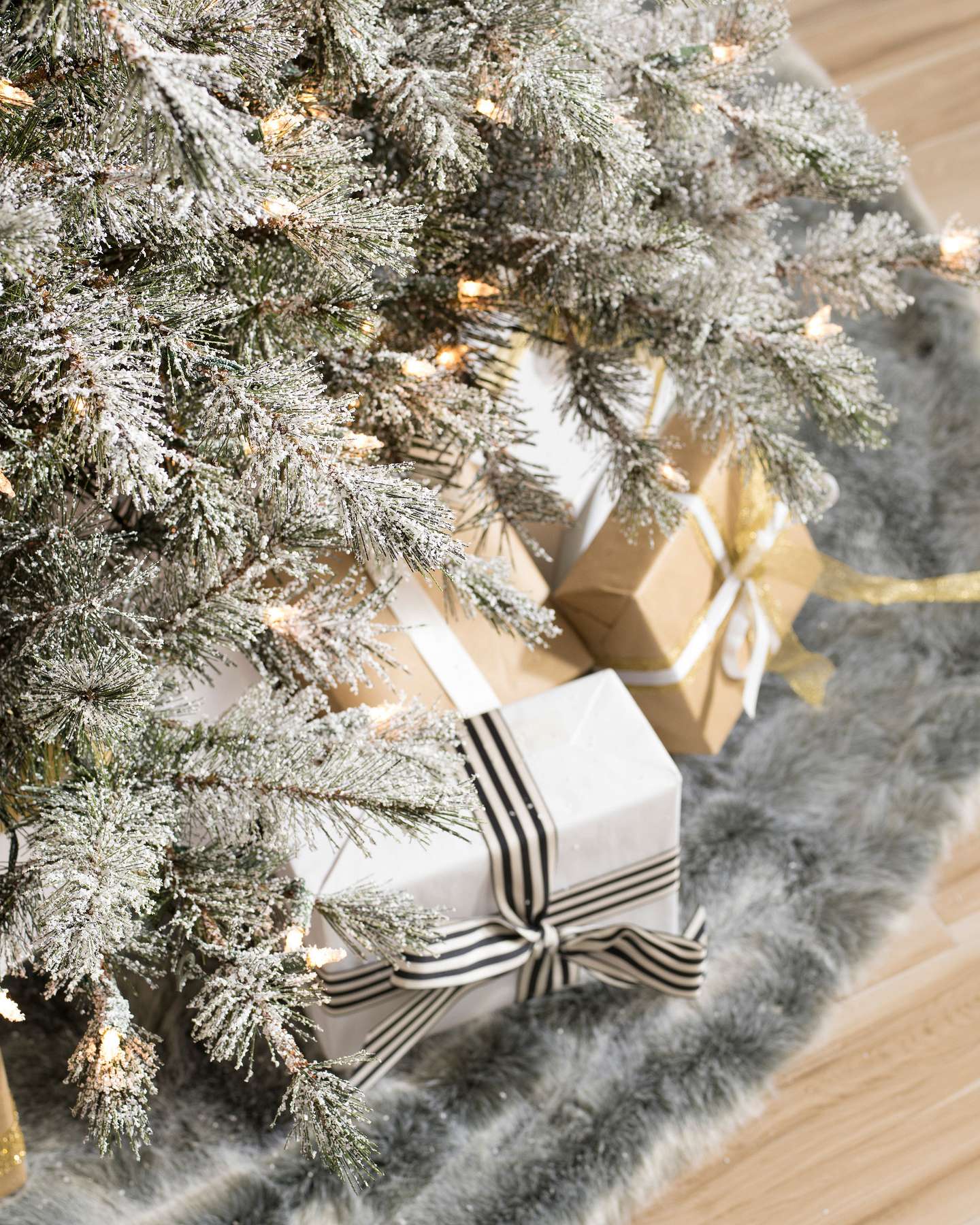 Balsam Hill Frosted Sugar Pine Artificial Christmas Tree Display with Tree Skirt Background