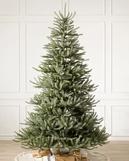 Artificial Christmas tree with light green foliage