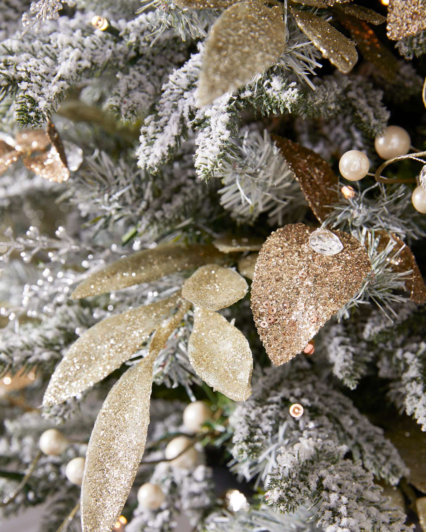 Balsam Hill 4-Foot Champagne and Crystal Potted Artificial Christmas Tree with LED Clear Lights Closeup