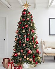 Christmas tree decorated with red and gold ornaments