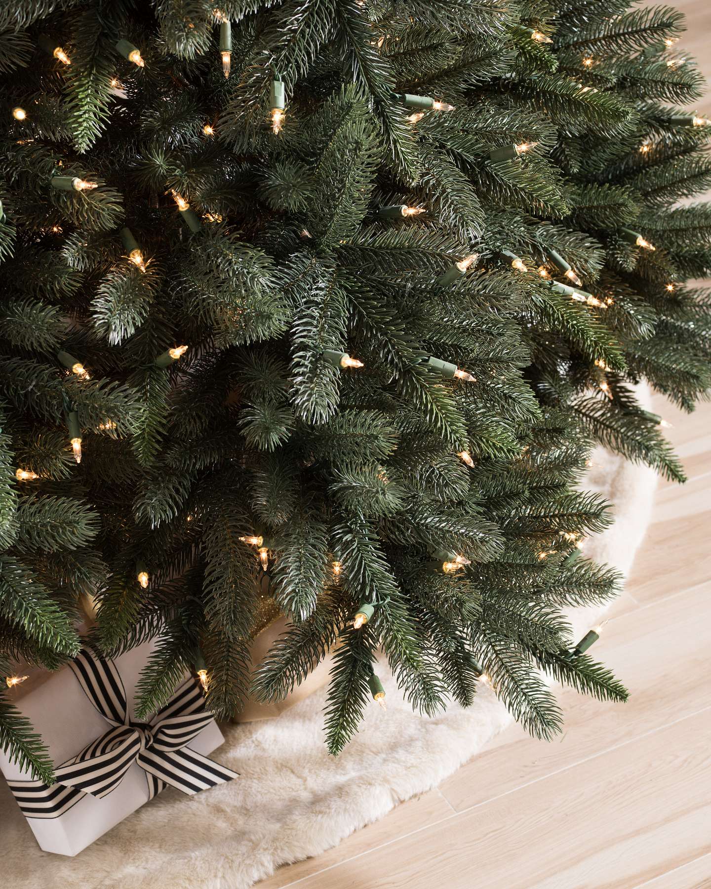 Balsam Hill Aspen Estate Fir Flip Artificial Christmas Tree Lifestyle Display with Tree Skirt