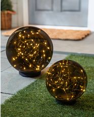 Pair of globe-shaped stake lights