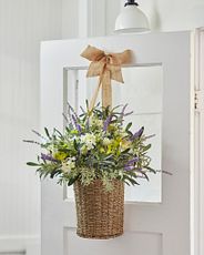 Hanging basket with white and purple flowers