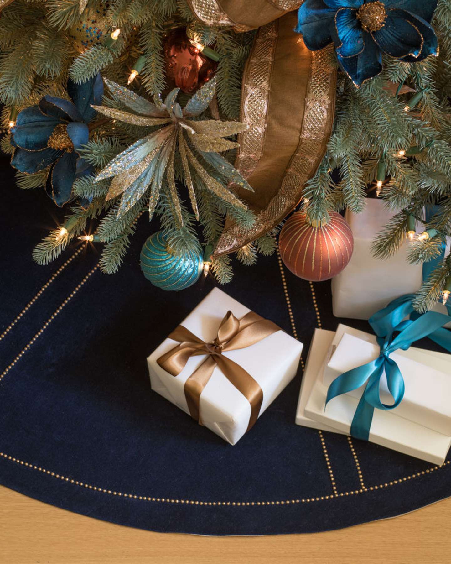 Balsam Hill Blue Spruce Flip Artificial Christmas Tree Lifestyle Display with Tree Skirt