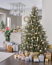 Decorated Christmas tree in a kitchen
