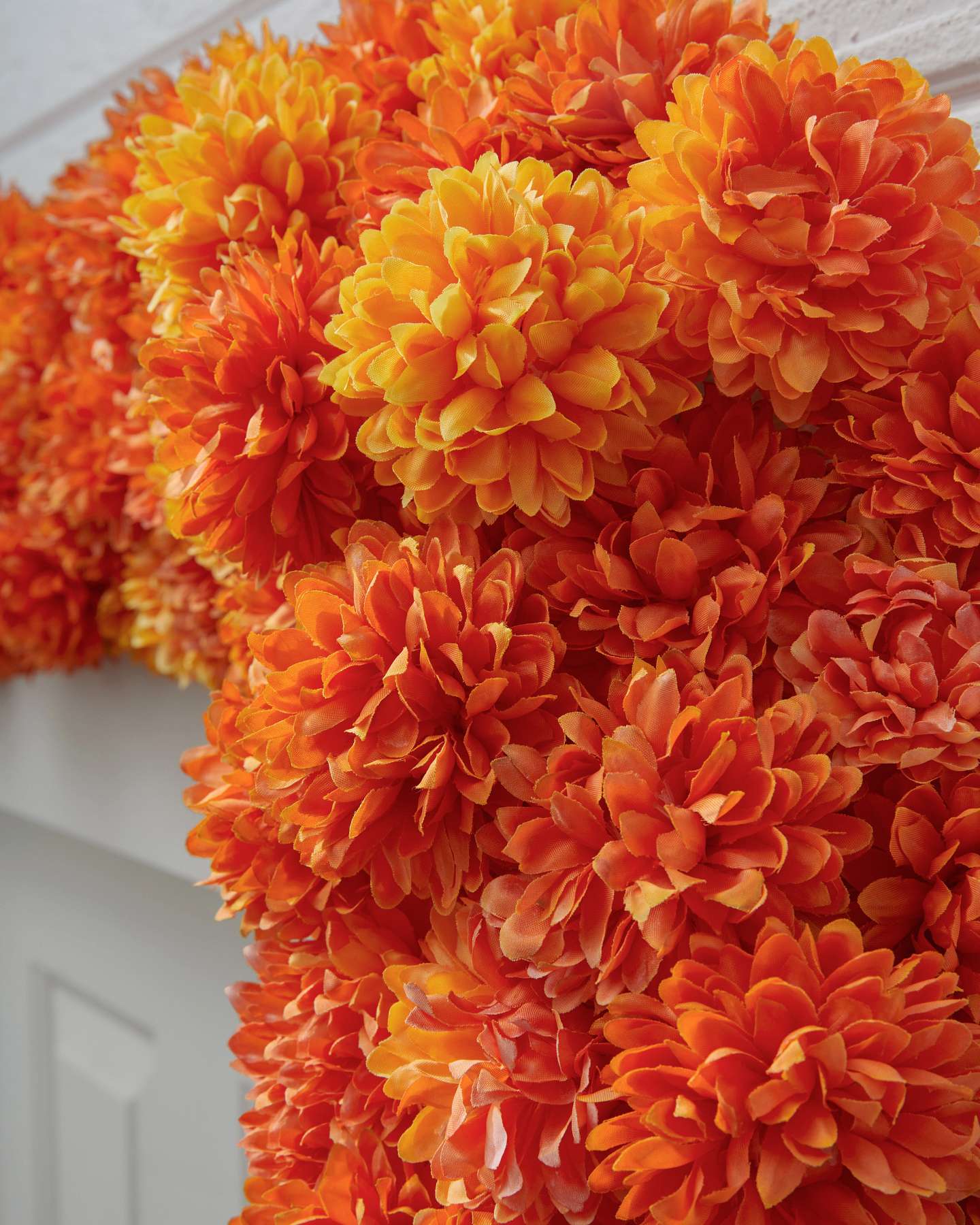 Balsam Hill Outdoor Marigold Meadow Artificial Fall Garland Close-Up