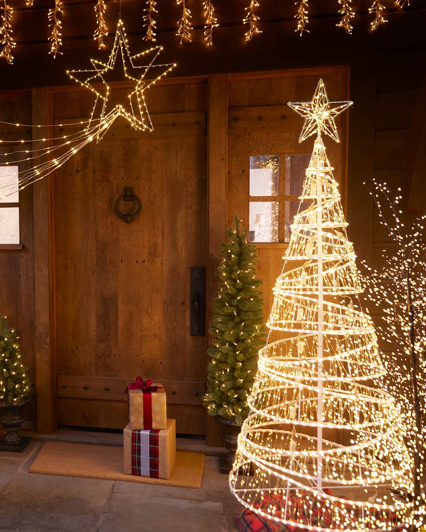 Balsam Hill Outdoor Lit Spiral Ribbon Artificial Christmas Tree Festive Scene