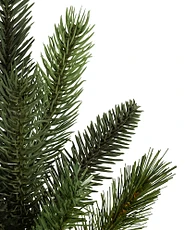 Close up of a realistic Balsam Hill Christmas tree branch tip
