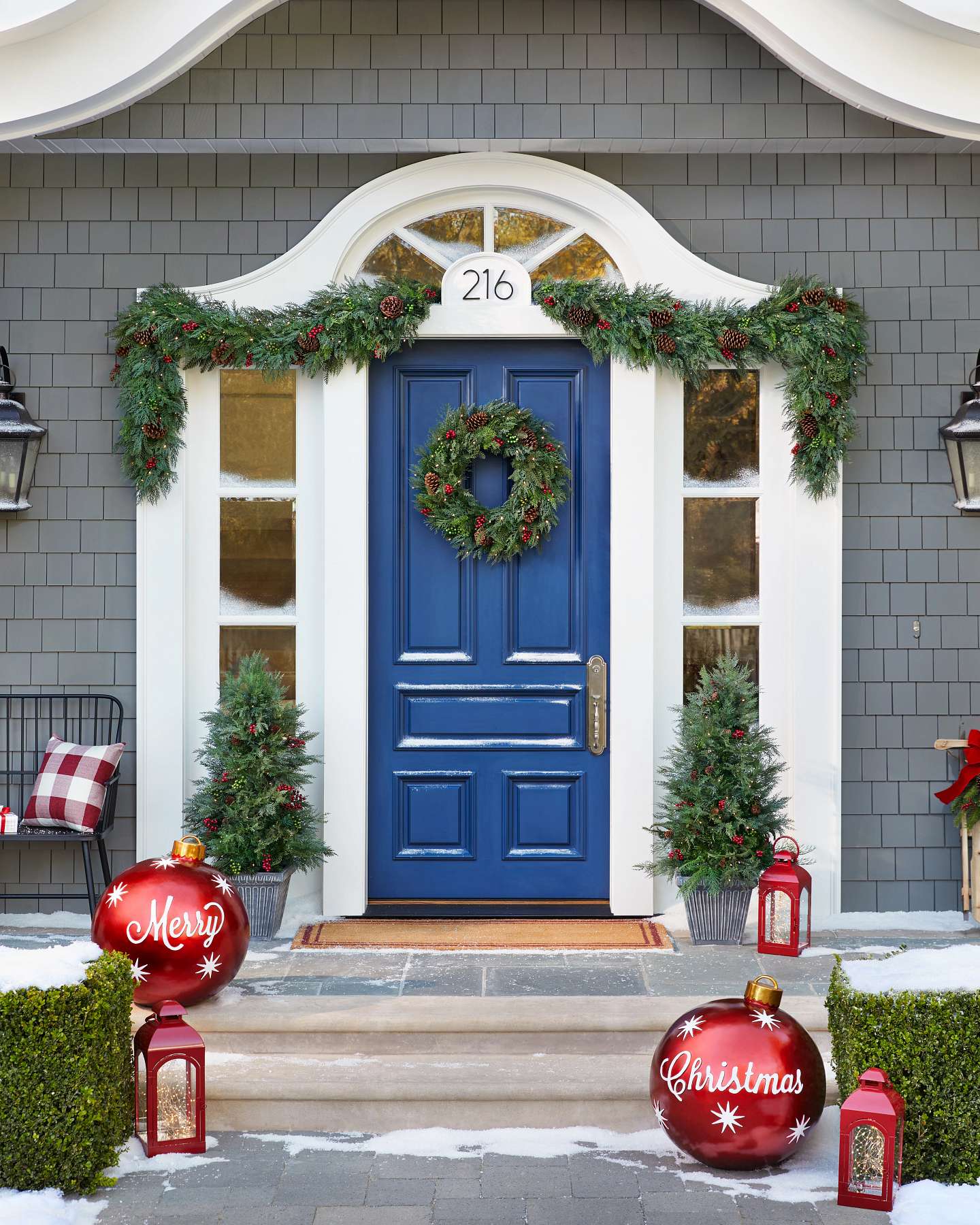 Balsam Hill Outdoor Winter Evergreen Artificial Christmas Foliage in a Cozy Home Setting