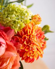 Closeup of artificial hydrangeas and mums