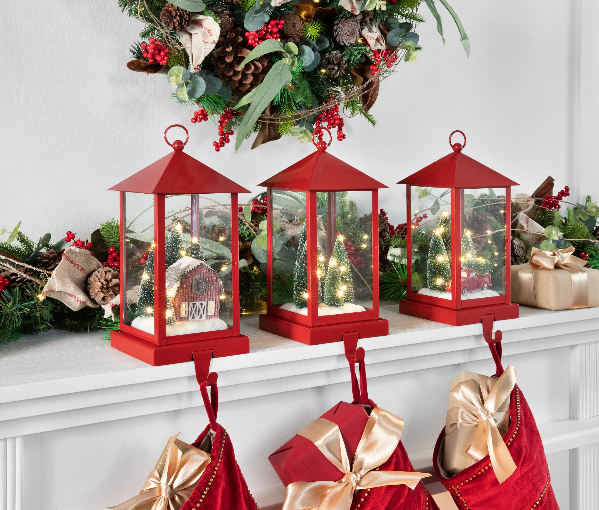 Lantern stocking holders on a mantel