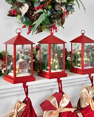 Lantern stocking holders on a mantel