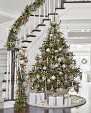 Artificial tree decorated with silver and crystal ornaments