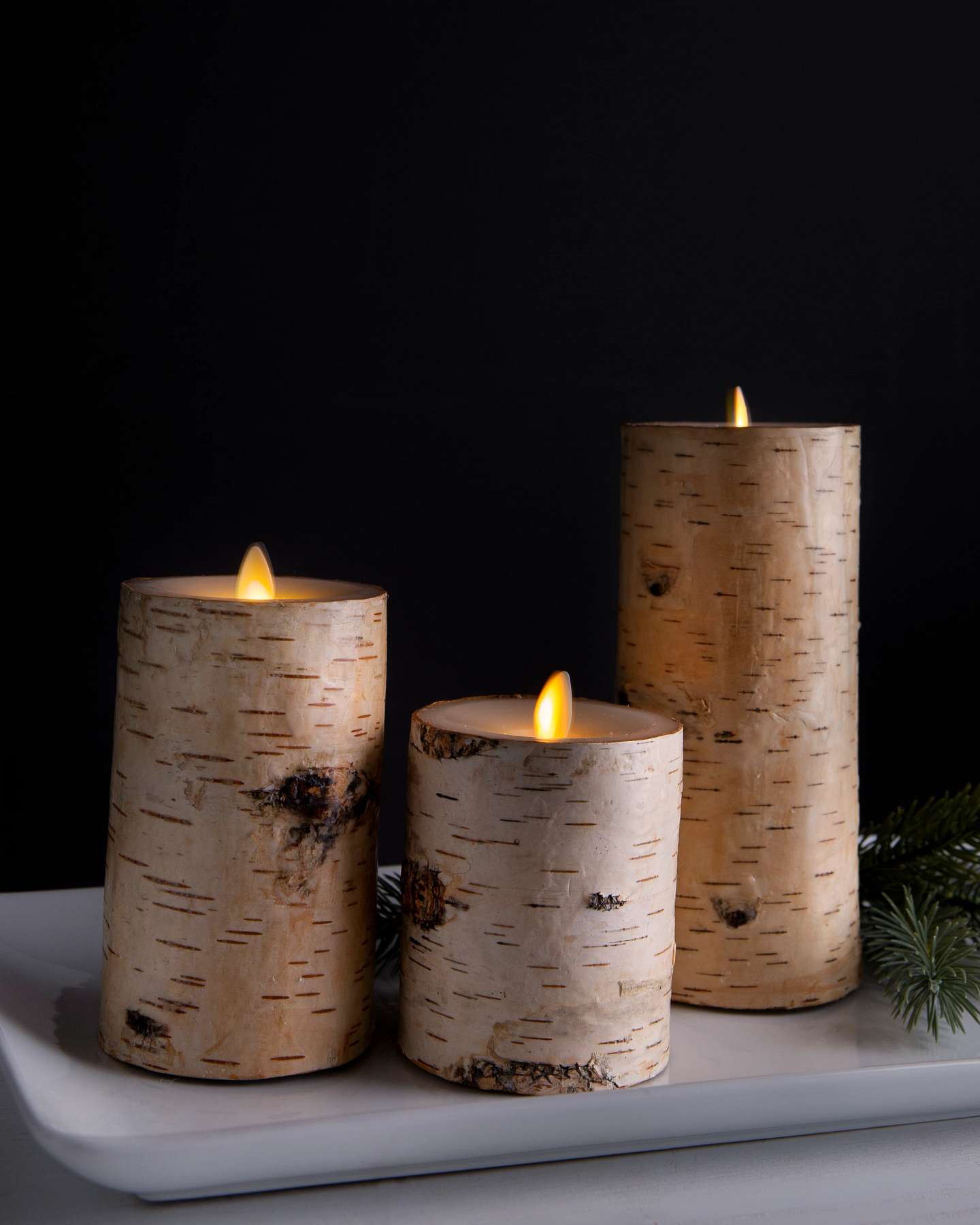 Balsam Hill Miracle Flame LED Birch Candle Displayed in Nature-Inspired Indoor Décor