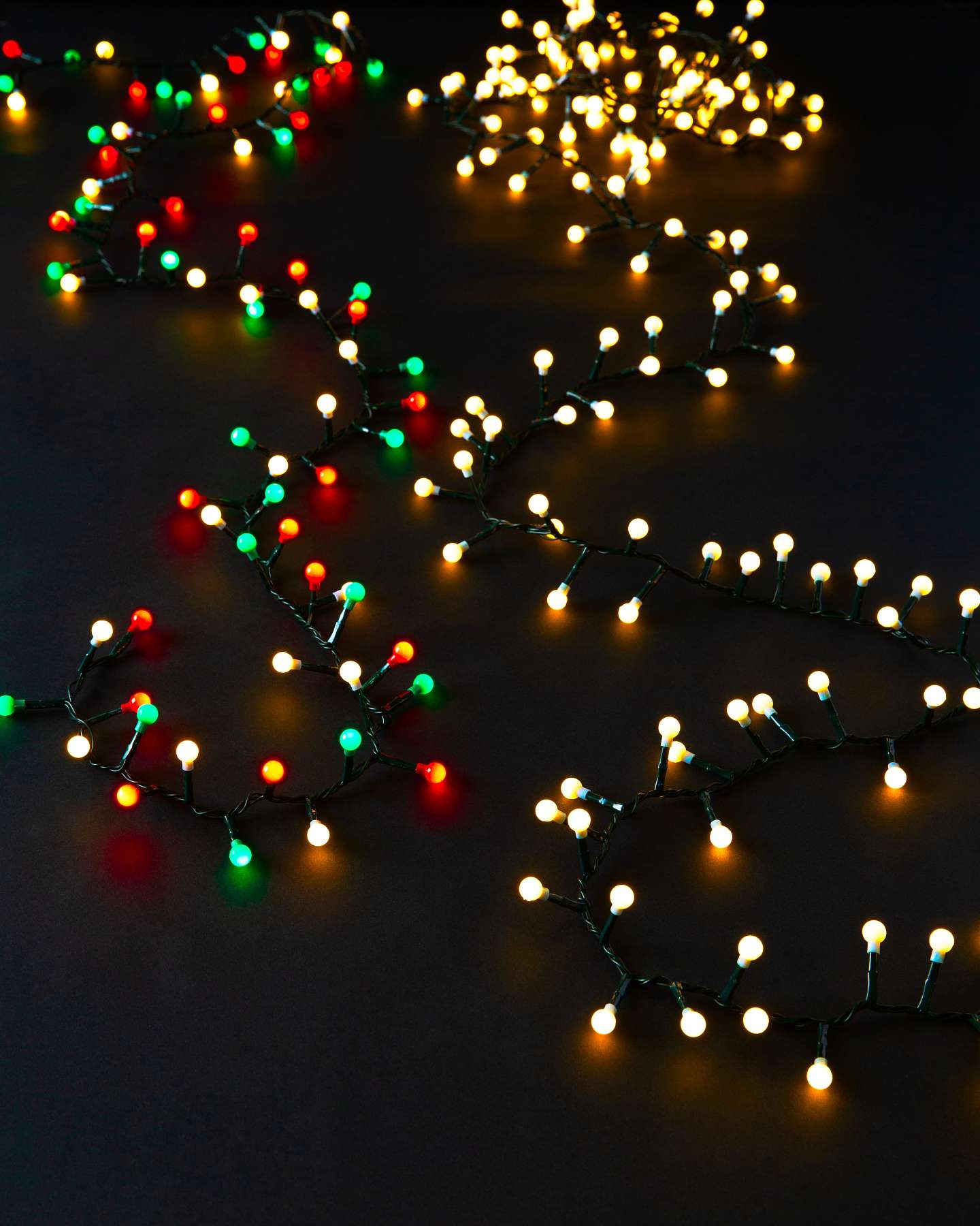Balsam Hill Cherry Light String Lifestyle Display with Dark Background