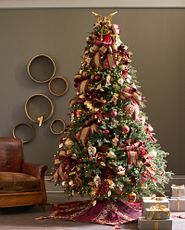 Christmas tree with ornaments and angel topper