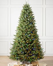 Pre-lit artificial Christmas tree with clear and multicolor LED lights