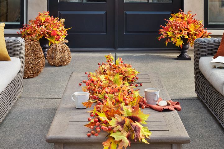 Outdoor seating area with fall décor