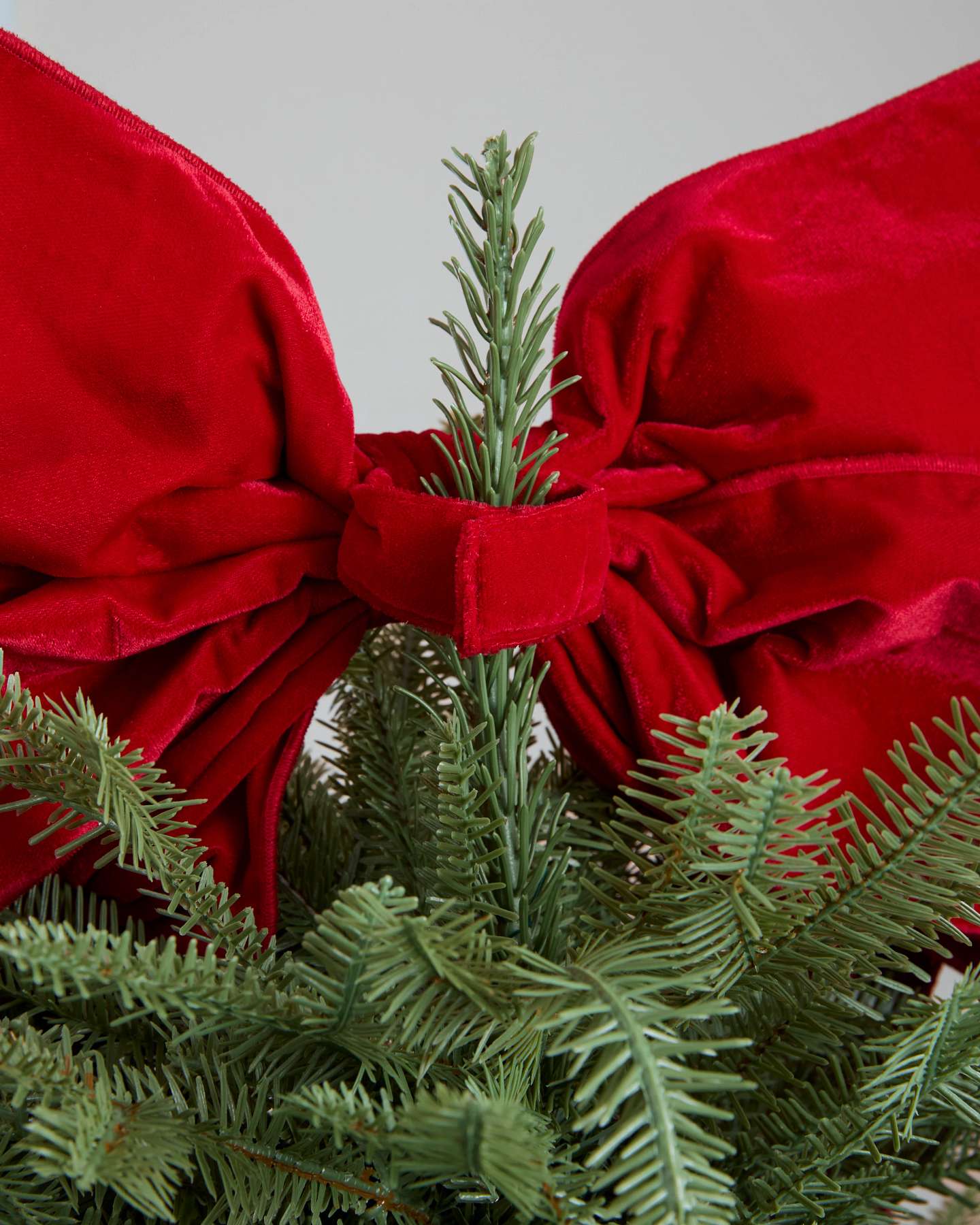 Boucle en velours rouge pour cime de sapin de Noël