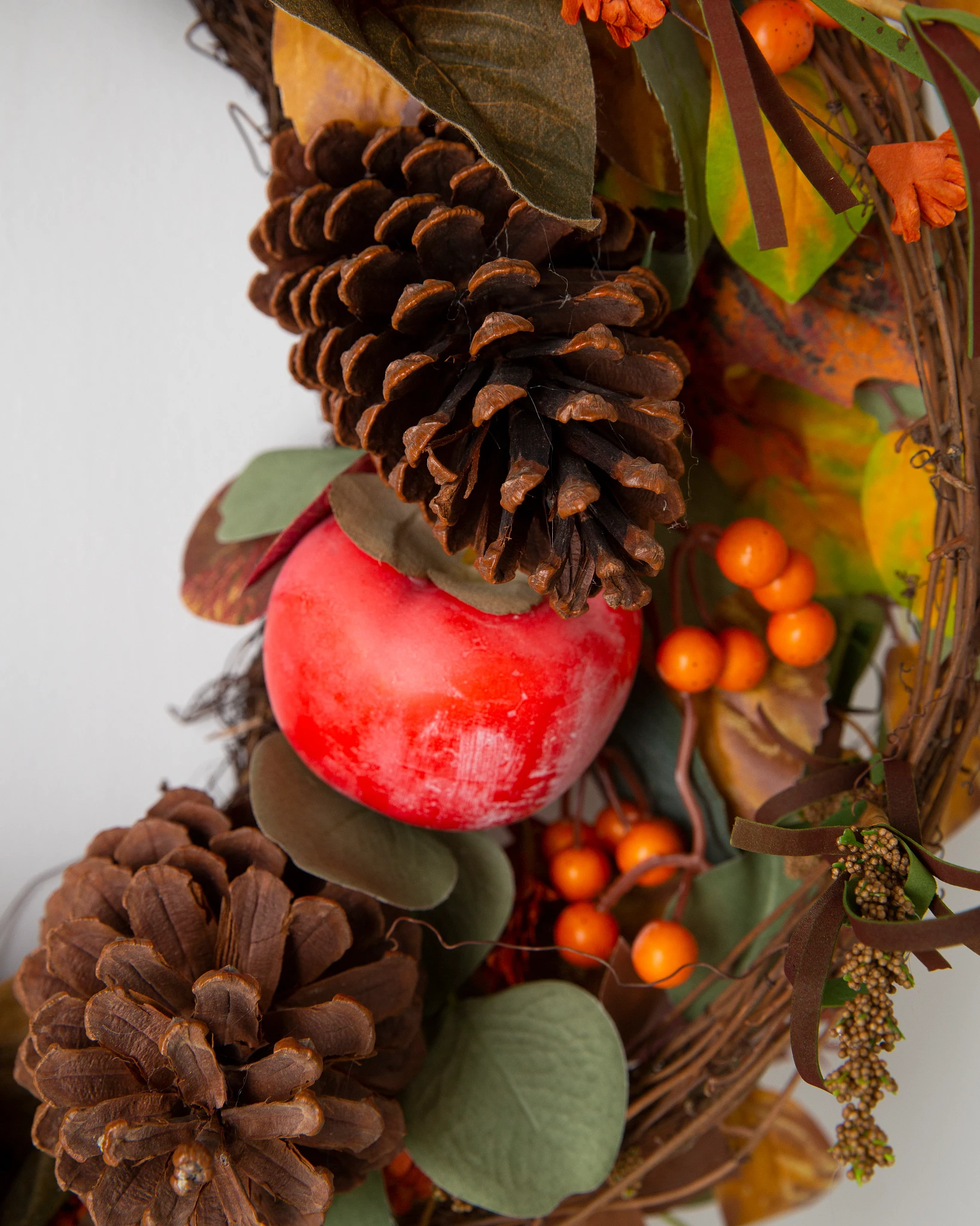 Persimmon and Pinecone Arrangement