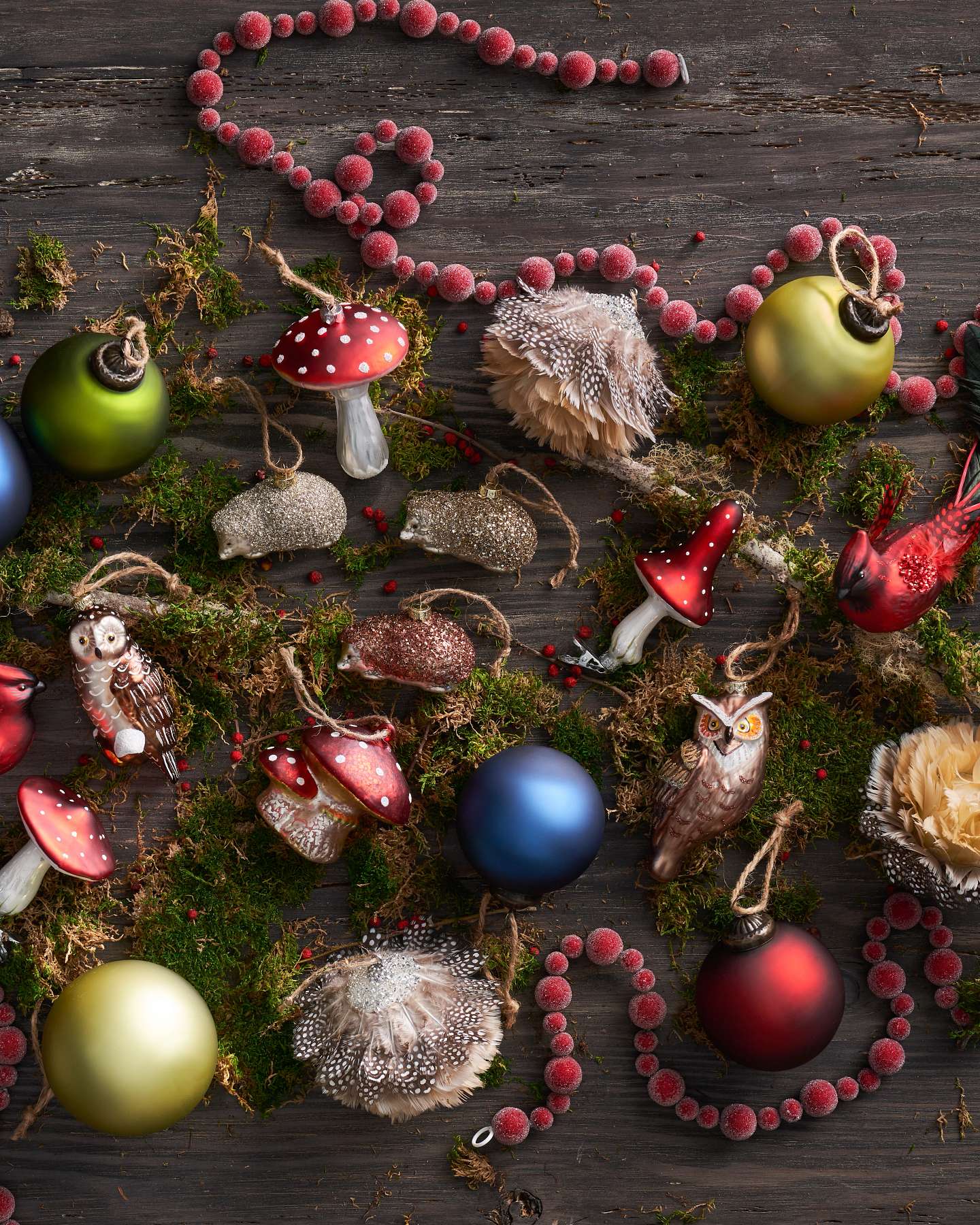 Balsam Hill Enchanted Woodlands Christmas Ornament Set of 25 Lifestyle Display with Rustic Background
