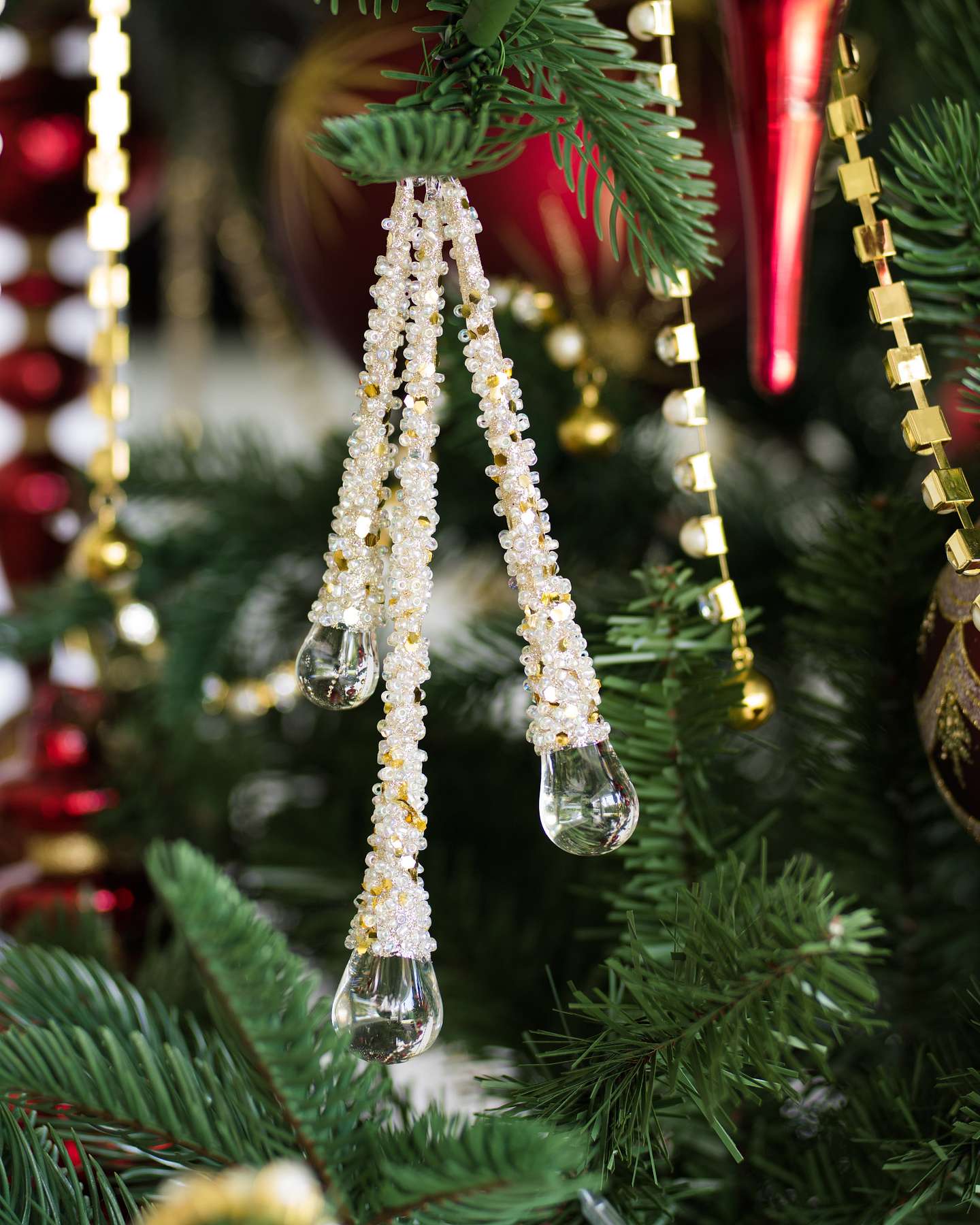 Balsam Hill Icy Teardrop Ornaments Lifestyle Three Hanging Closeup