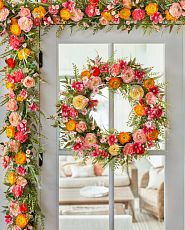 Wreath and garland on glass door