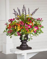 Colorful flowers in a brass vase