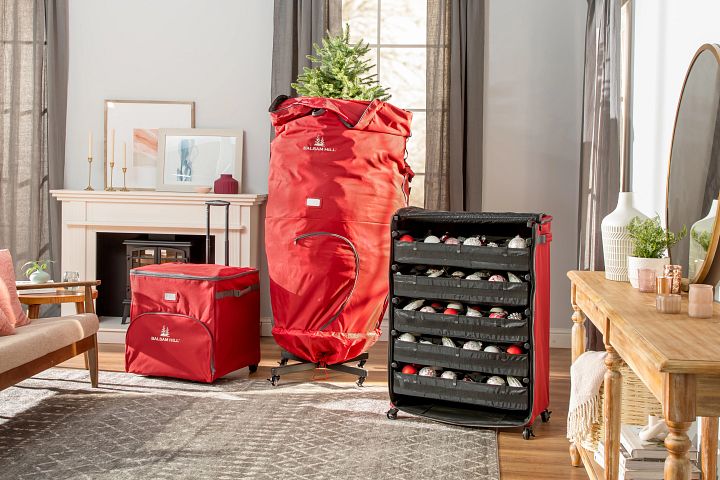 Red Balsam Hill storage bags for ornaments and artificial trees in living room