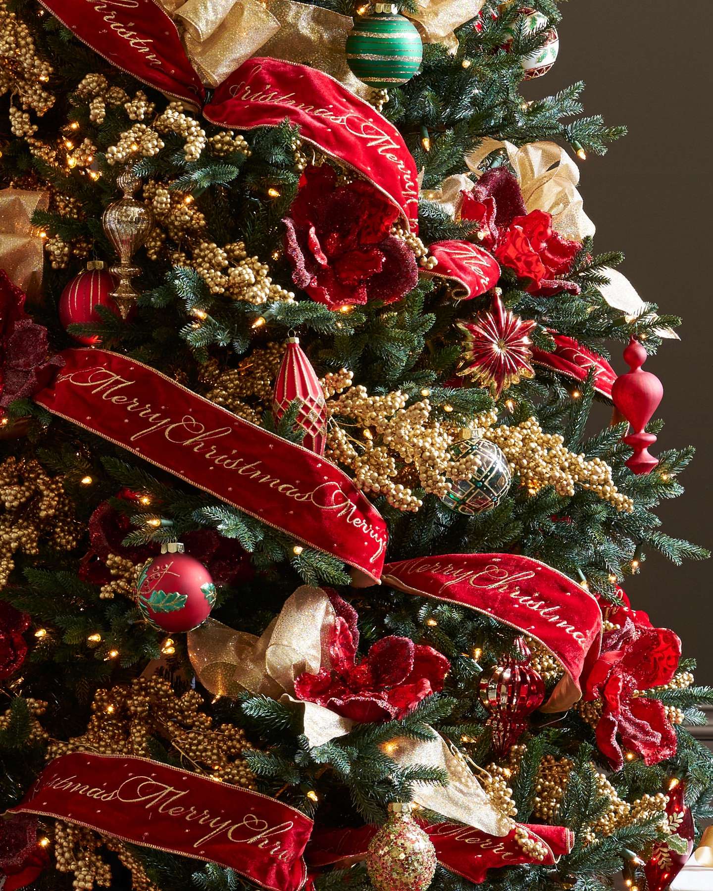 Balsam Hill Colorado Mountain Spruce Flip Artificial Christmas Tree Lifestyle Display with Red Ribbon