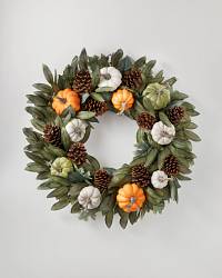 Fall décor wreath with pumpkins and eucalyptus leaves