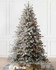 Frosted sugar pine artificial Christmas tree pre-lit with clear lights
