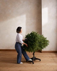 Woman setting up a Flip Tree