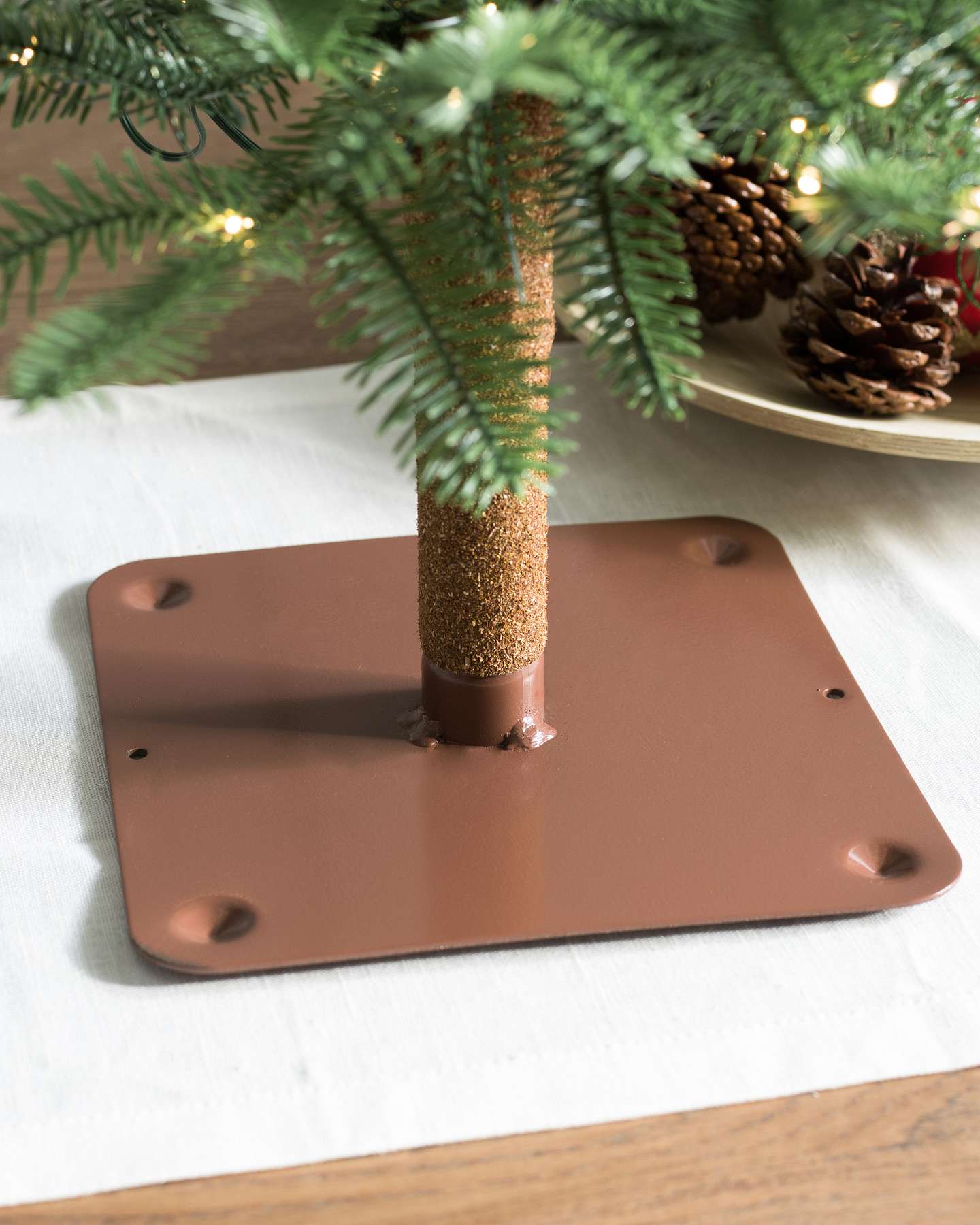 Balsam Hill 3-Foot LED Alpine Balsam Fir Artificial Tabletop Christmas Tree Stand Closeup