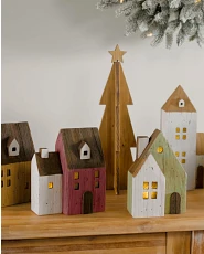 Wooden tiny houses with Christmas tree