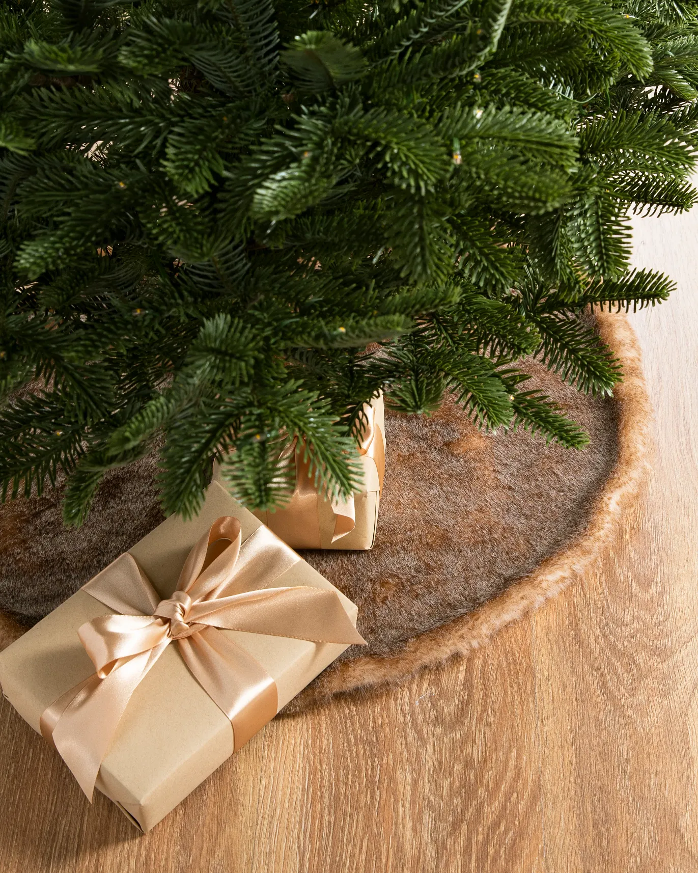 Faux fir tree skirts in gray, brown, and ivory colours