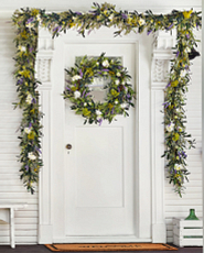 spring wreath and garland on doorway