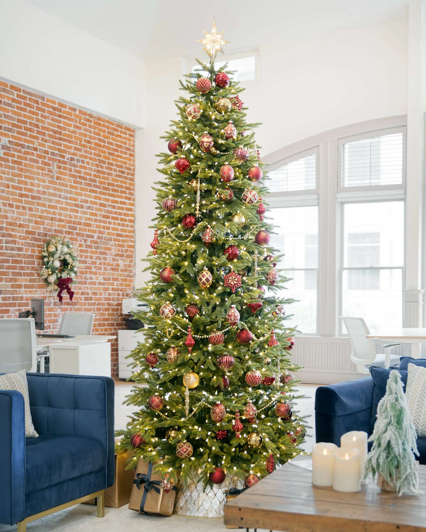Balsam Hill Silverado Slim Artificial Christmas Tree with Ornaments in a Holiday Display