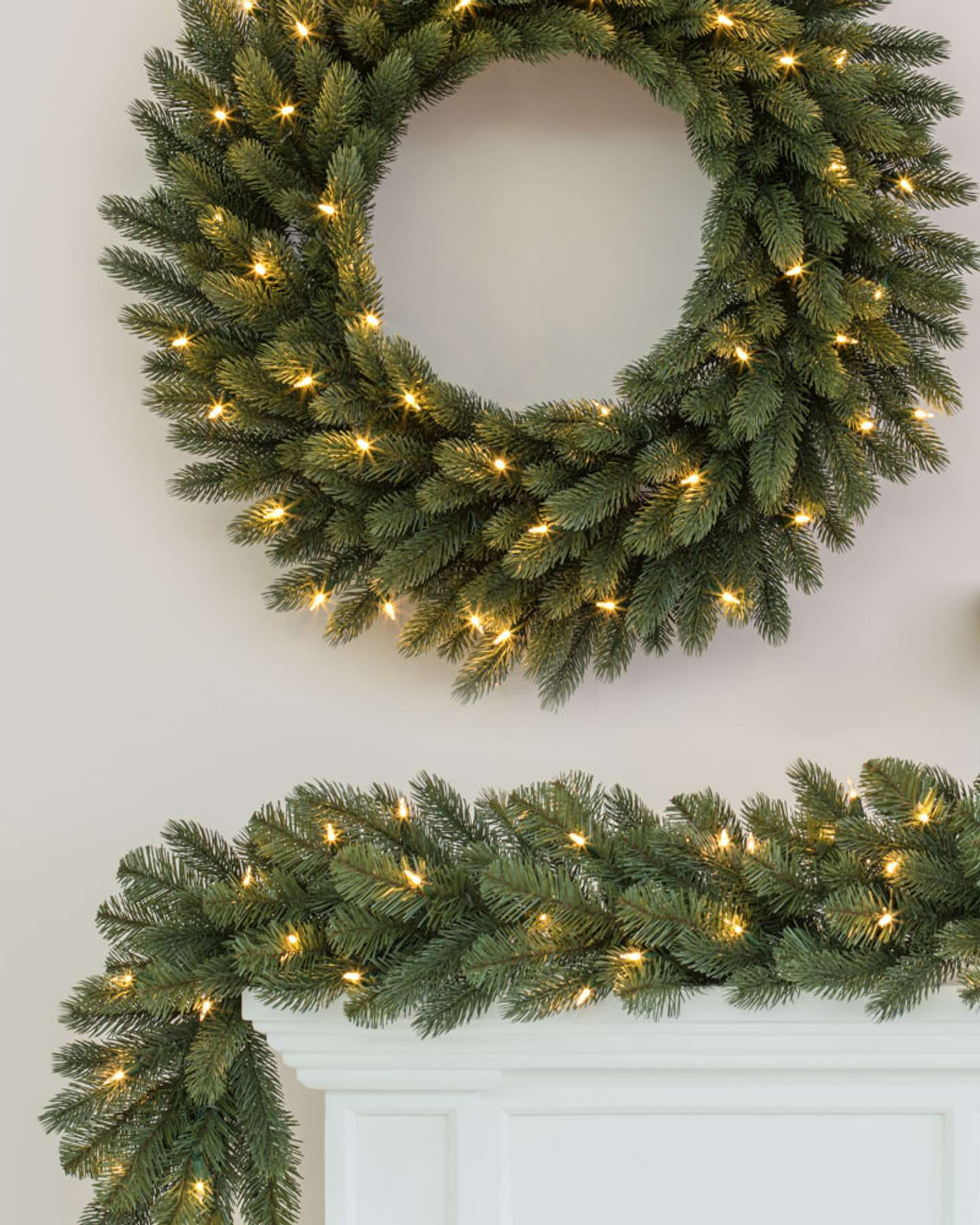 Balsam Hill Vermont White Spruce Artificial Christmas Wreath and Garland LED Clear in Cozy Fireplace Setting