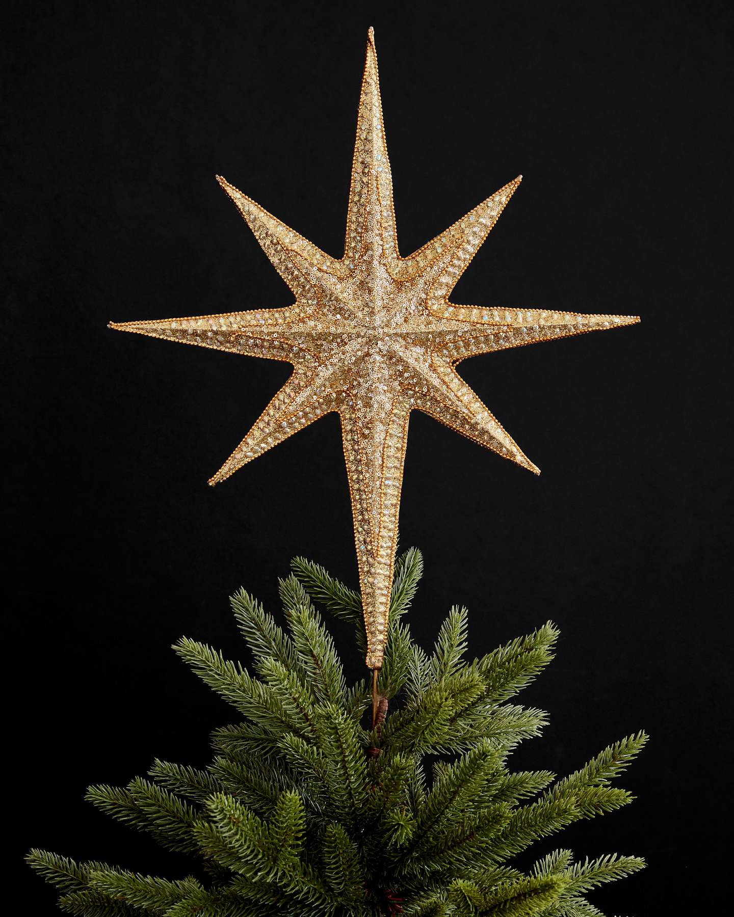 Balsam Hill Star Beaded Christmas Tree Topper in a Festive Setting